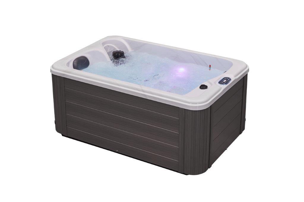 Relaxing in the luxurious Cashmere 2 Person Hot Tub Spa with 15 Jet Lounger LS-790