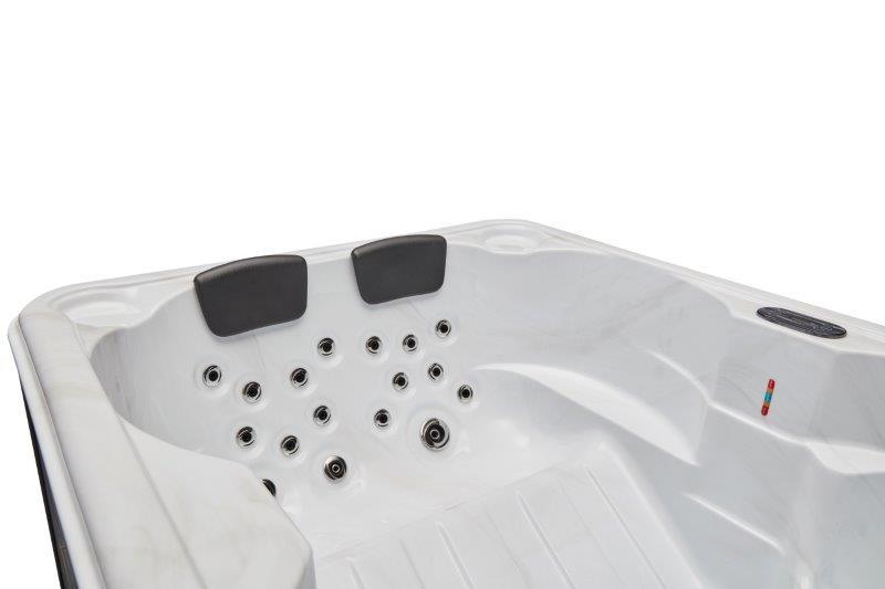 Luxurious Riley hot tub spa with 26 jets and ozonator function