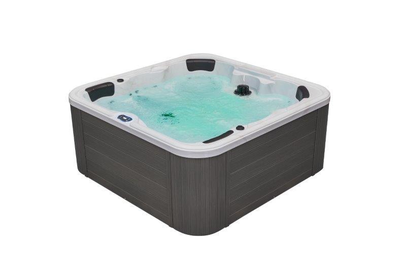 Relaxing in the luxurious Eclipse 6 Person Hot Tub Spa with 51 Jets & Bluetooth WS-192