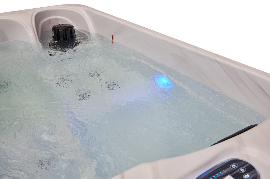 Relaxing in the luxurious Cashmere 2 Person Hot Tub Spa with 15 Jet Lounger LS-790