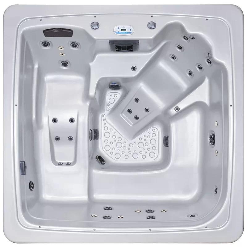 Relaxing in the luxurious Cyanna Valley Galaxy 6 Person 41-Jet Square Hot Tub Spa with Ozonator, perfect for enjoying a soothing hydrotherapy experience at home