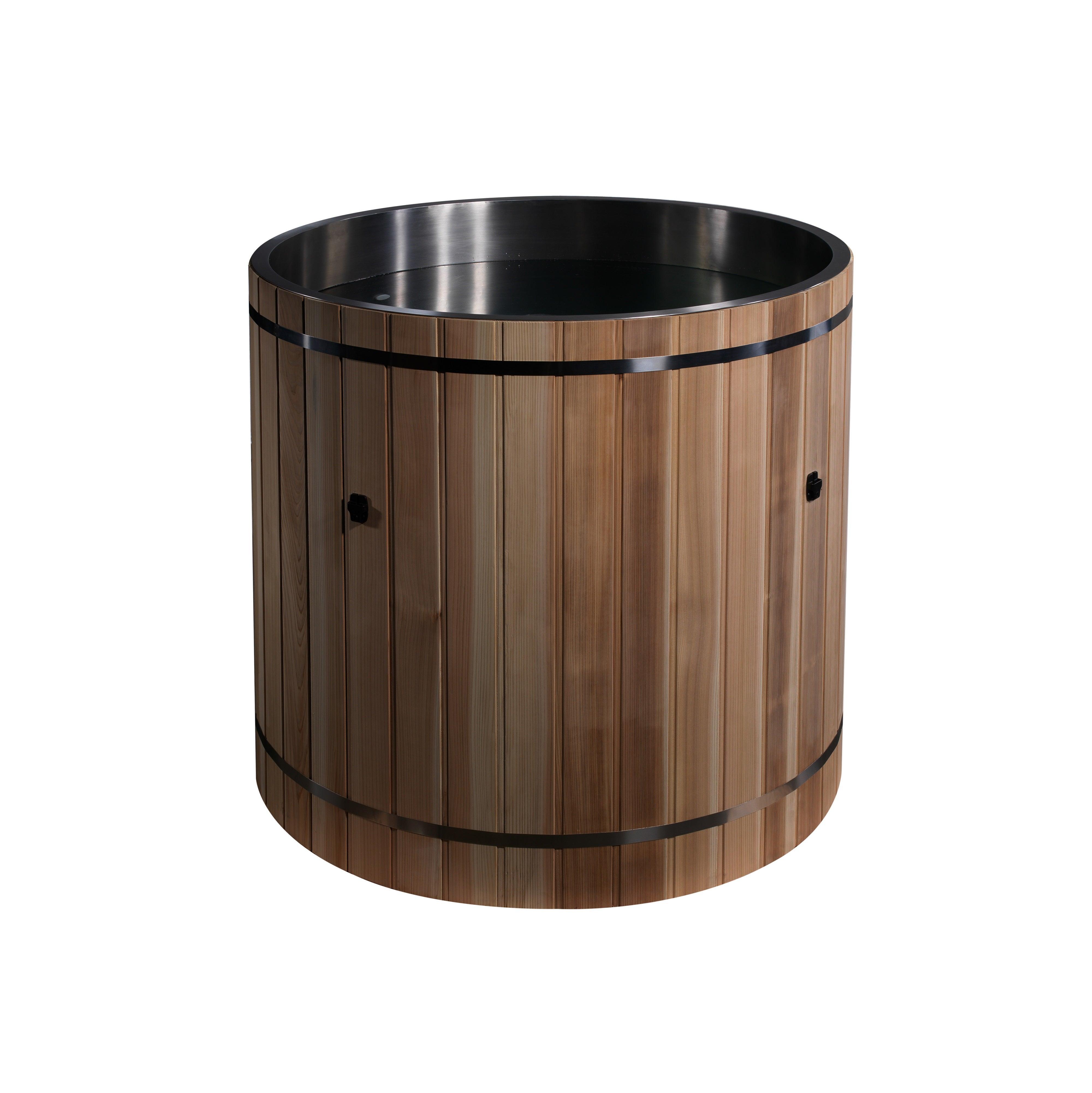 A person enjoying the cold plunge therapy in the barrel