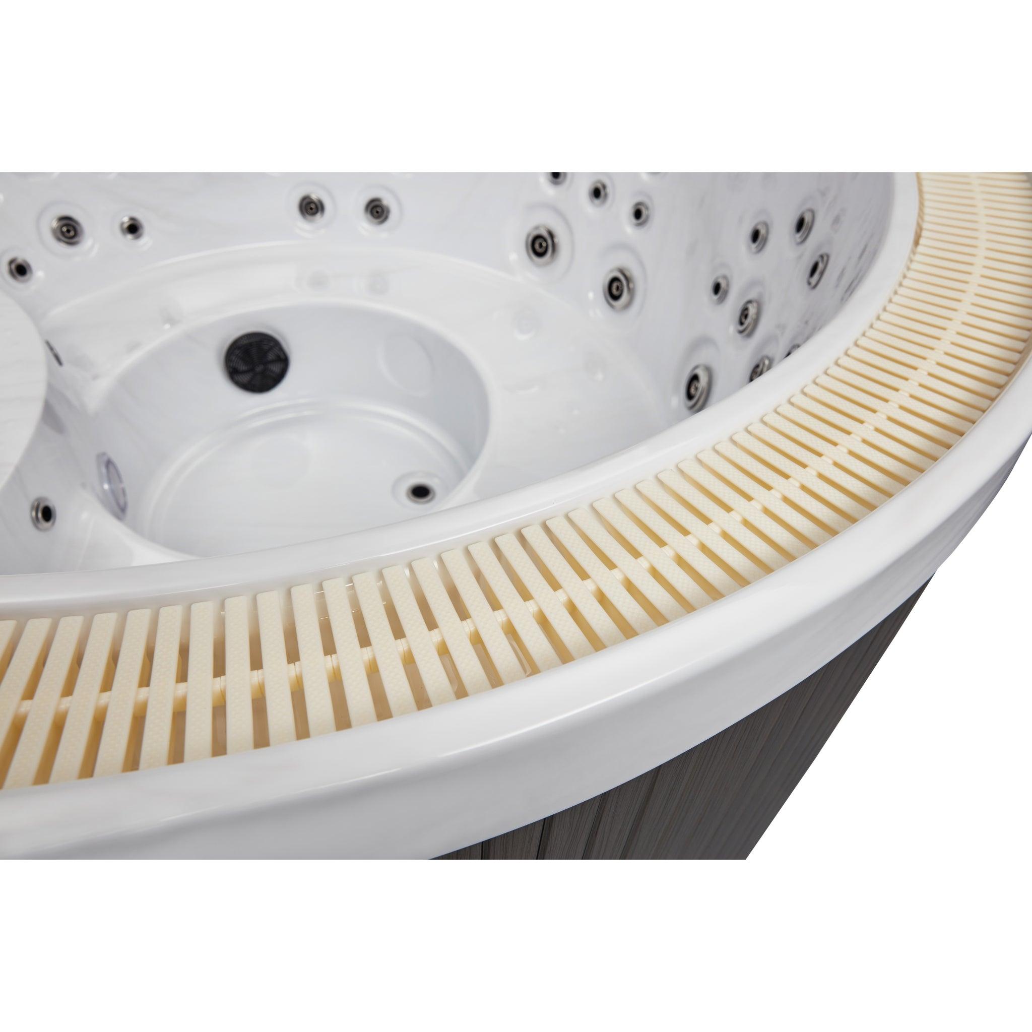 Relaxing in the Oscar 6 Person Round Hot Tub Spa with 52 Jets & Bluetooth WS-007