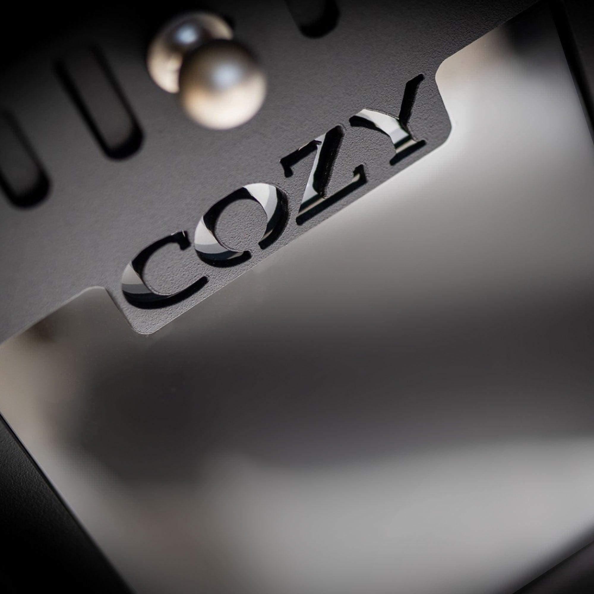 Cozy Heat OG Sauna Stove emitting warm, comforting heat in wooden sauna room