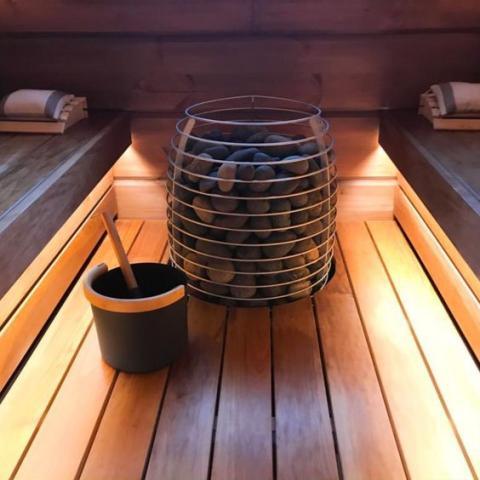 HUUM HIVE Electric Sauna Heater with Wooden Panels and Control Knob