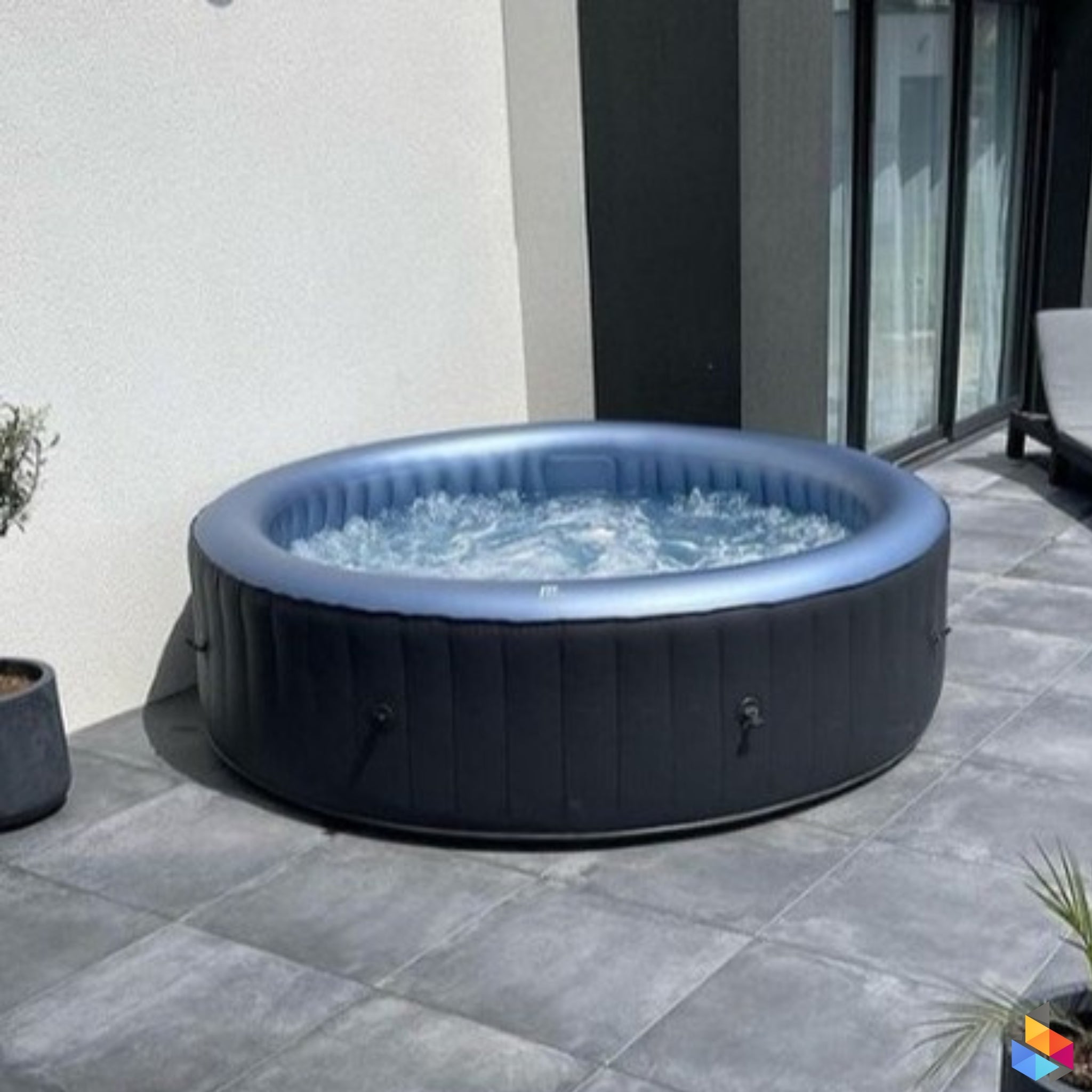 Enjoy a relaxing soak in the MSPA Bergen 4 Person Hot Tub, perfect for outdoor relaxation and therapeutic hydrotherapy