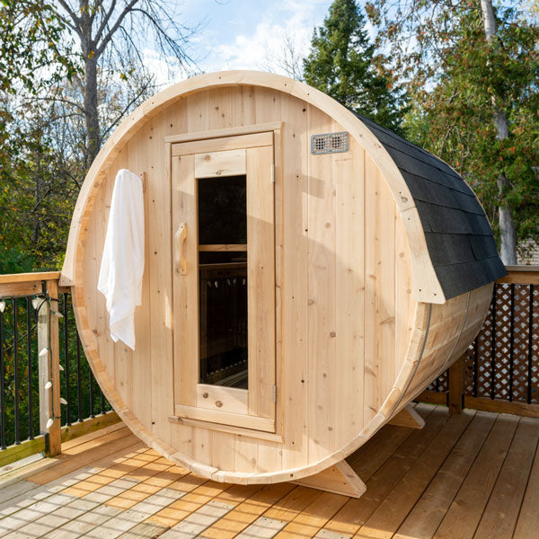 Four person outdoor barrel sauna with a rustic design and spacious interior | Harmony CTC22E