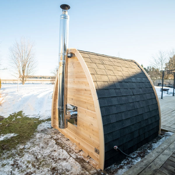 Outdoor Canadian Timber 4 Person Sauna with sloped roof and glass door